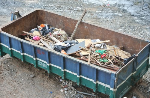 Construction site debris being cleared in Acton