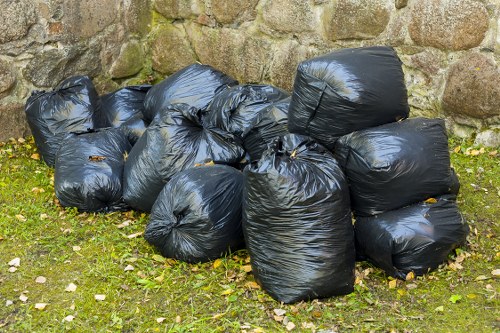 Variety of business waste types including recyclables and hazardous materials